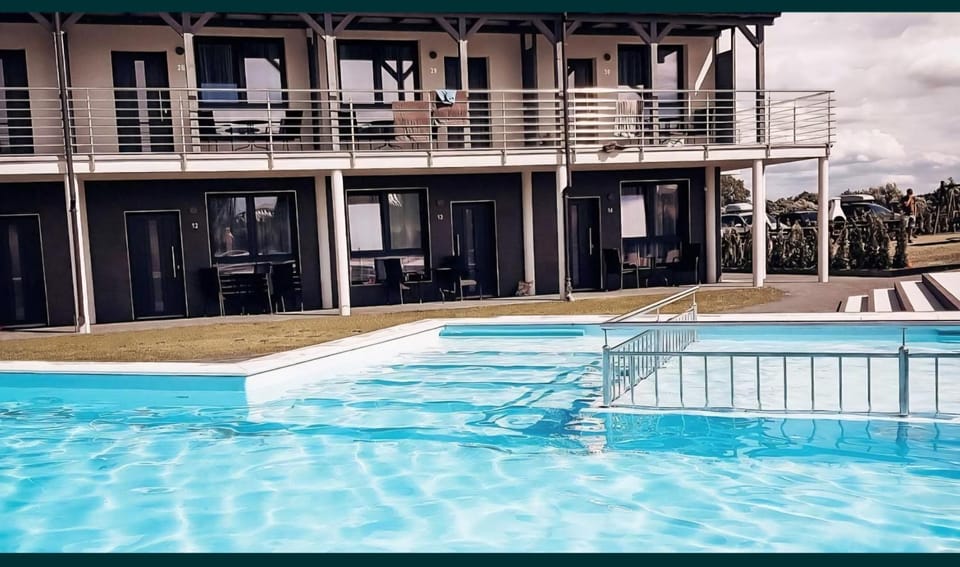 Property building, Day, Pool view, Swimming pool