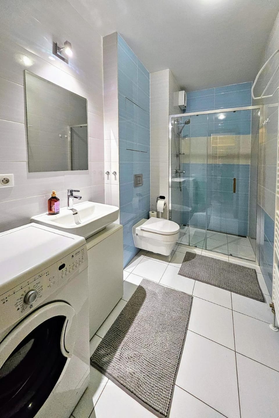 Shower, Toilet, towels, washing machine