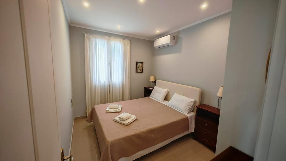 Bed, Photo of the whole room, Bedroom, towels, air conditioner