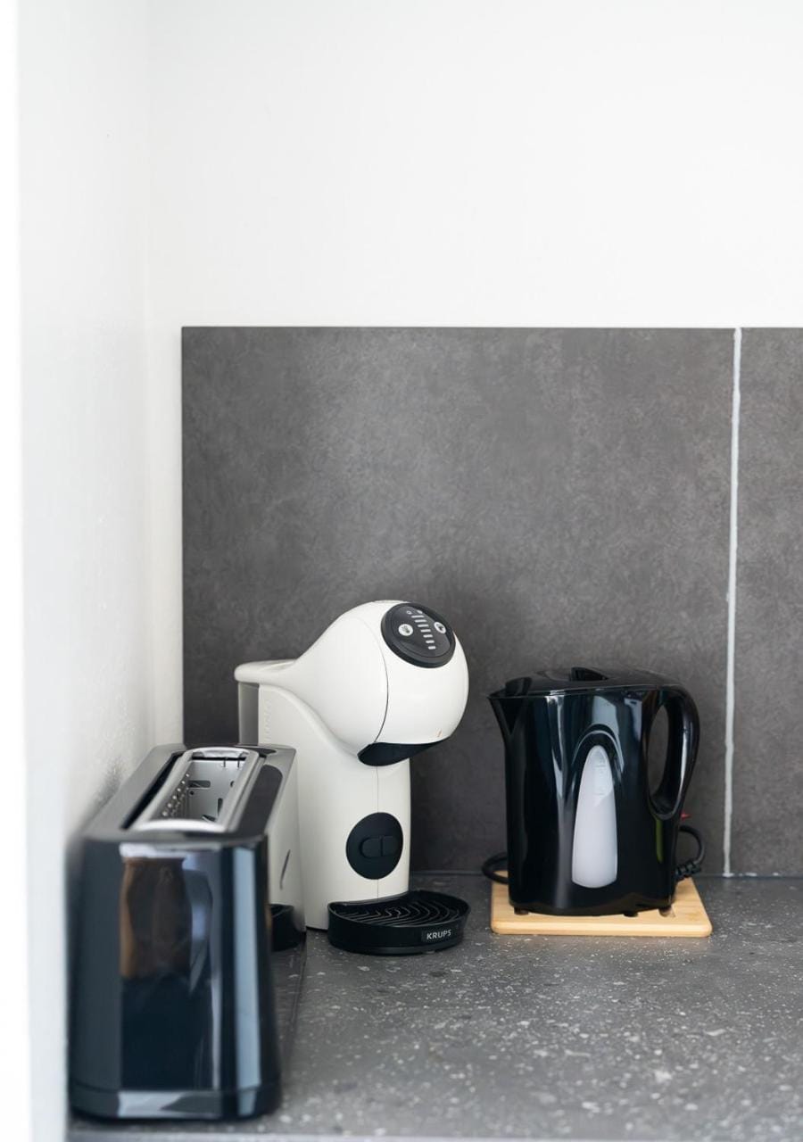 Kitchen or kitchenette, toaster