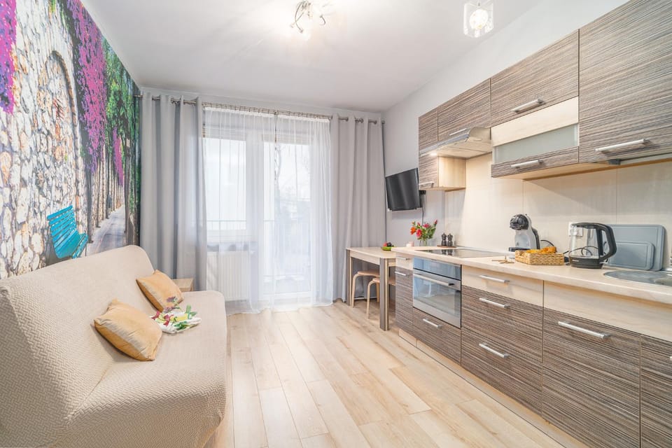 Kitchen or kitchenette, Living room, Seating area, Dining area