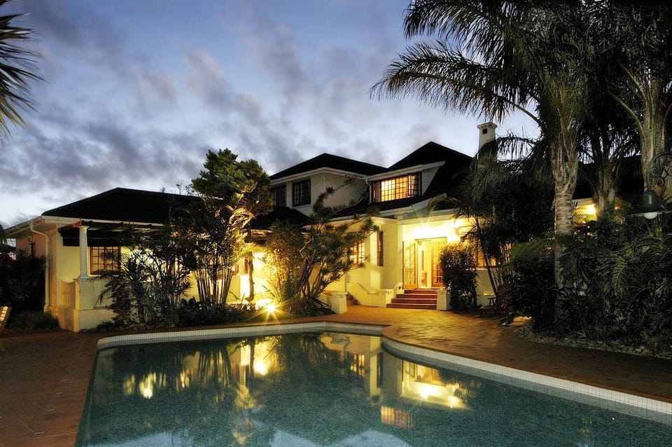 Property building, Facade/entrance, Night, Garden view, Pool view, Swimming pool