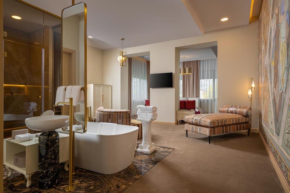 Toilet, Bed, Bathroom, Living room, Photo of the whole room, Seating area, Bedroom, Bath, towels