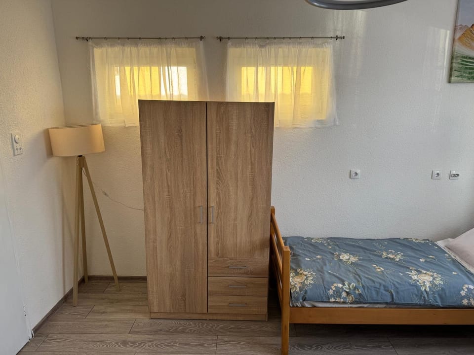 Bed, wardrobe