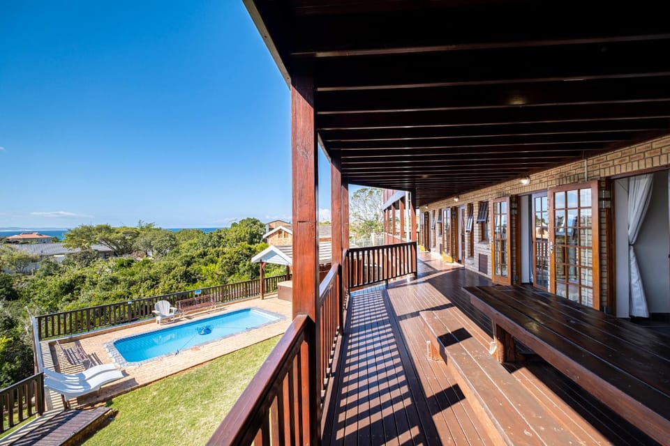 Property building, Patio, Day, Natural landscape, View (from property/room), Balcony/Terrace, Pool view, Swimming pool, sunbed