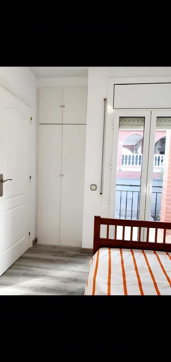 Property building, Living room, Bedroom