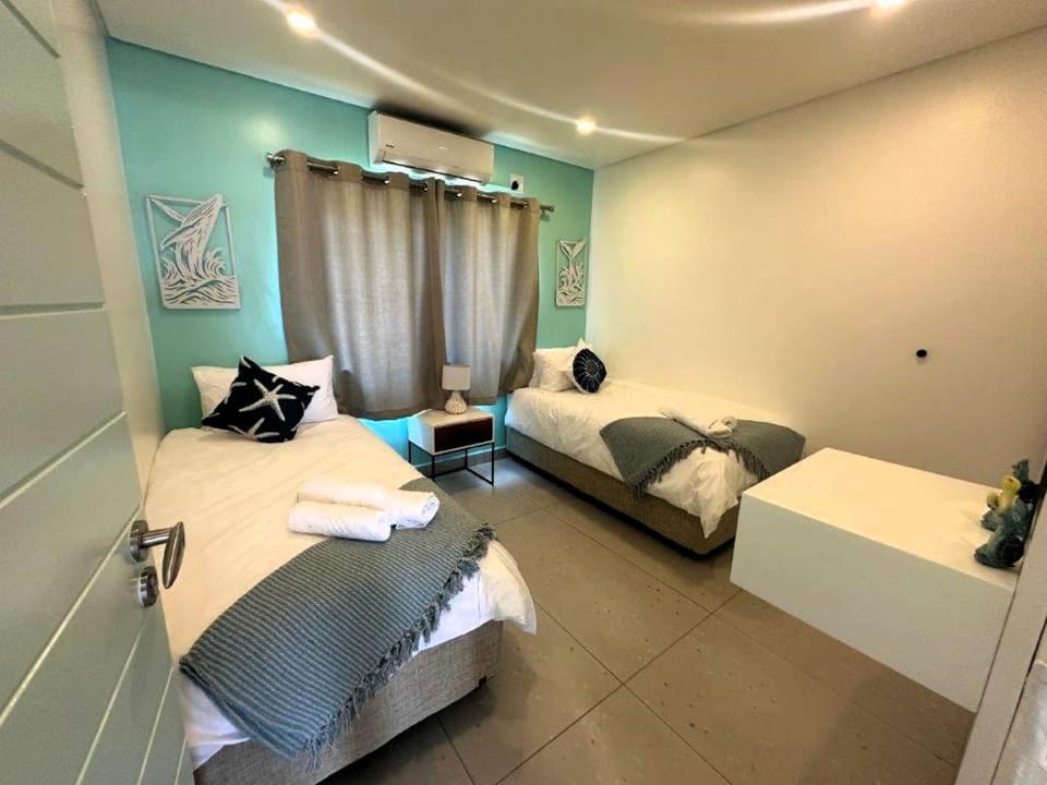 Bed, Photo of the whole room, Bedroom, towels, air conditioner