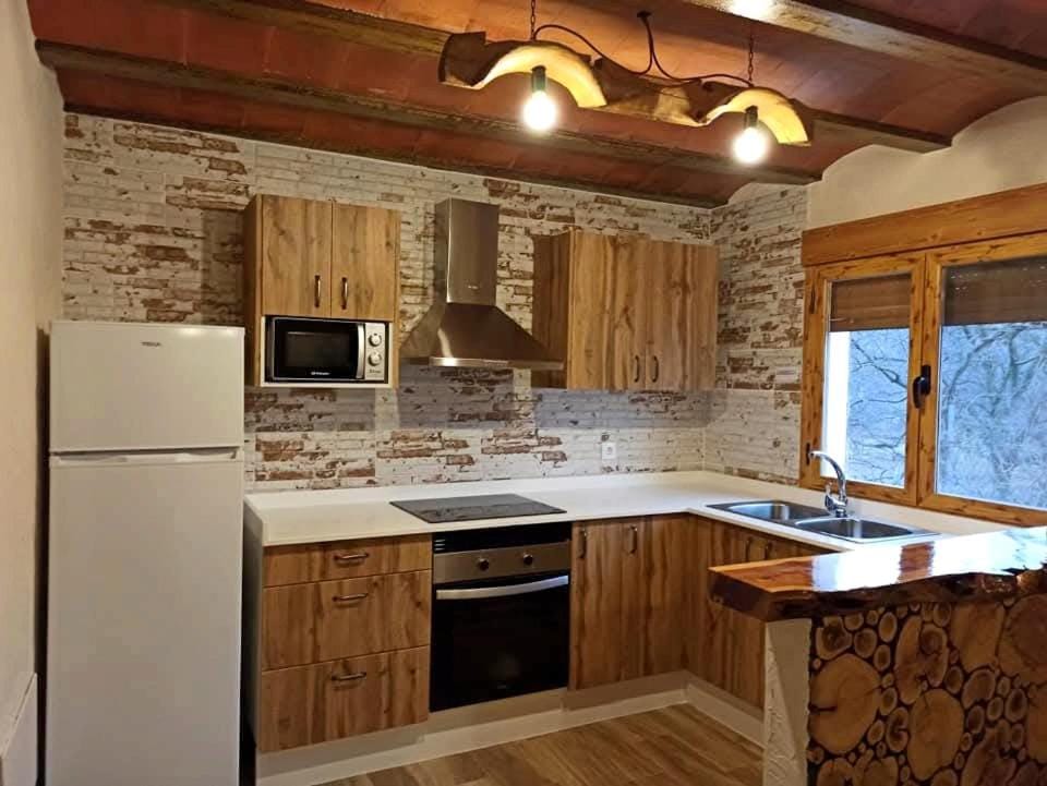 Kitchen or kitchenette, oven, stove