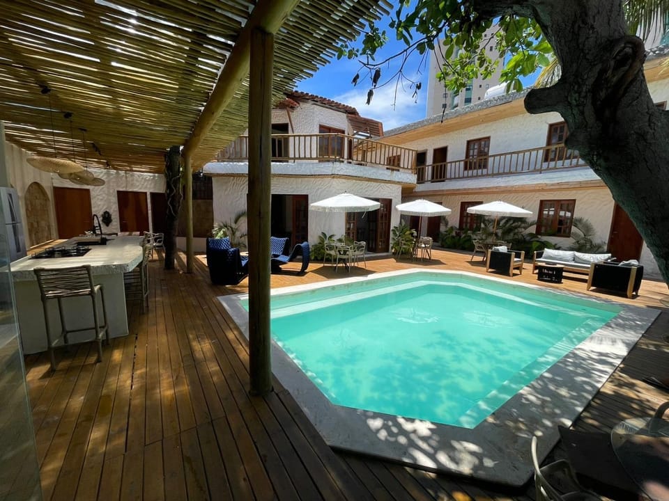 Property building, Patio, Day, Pool view, Swimming pool, sunbed
