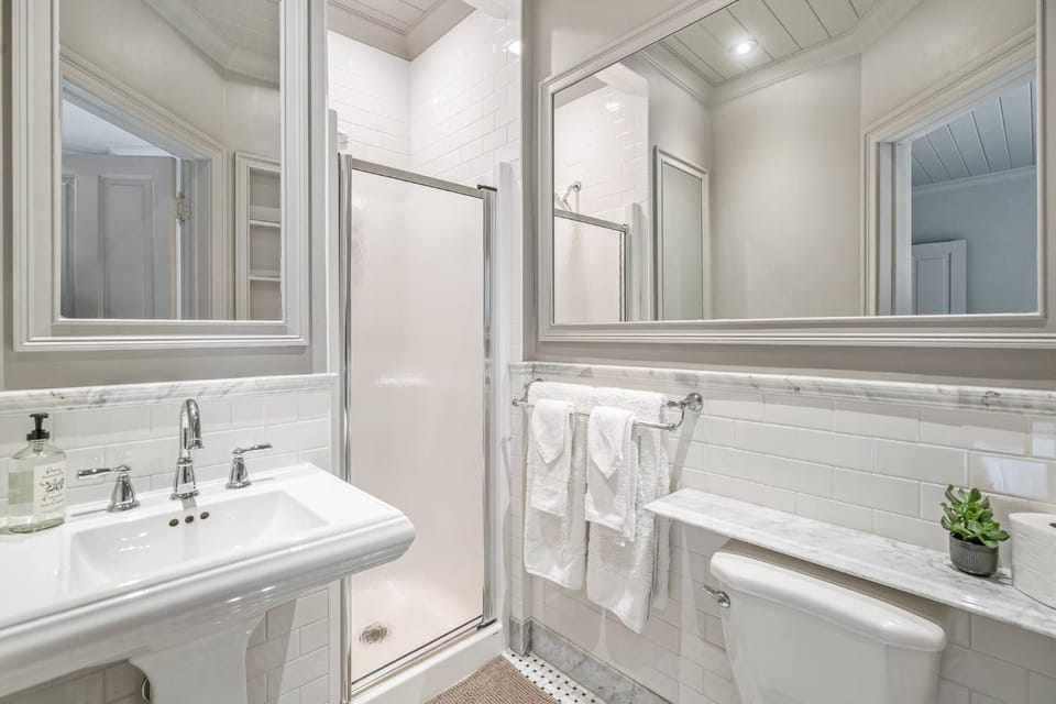 Shower, Toilet, Bathroom, hair dryier, towels