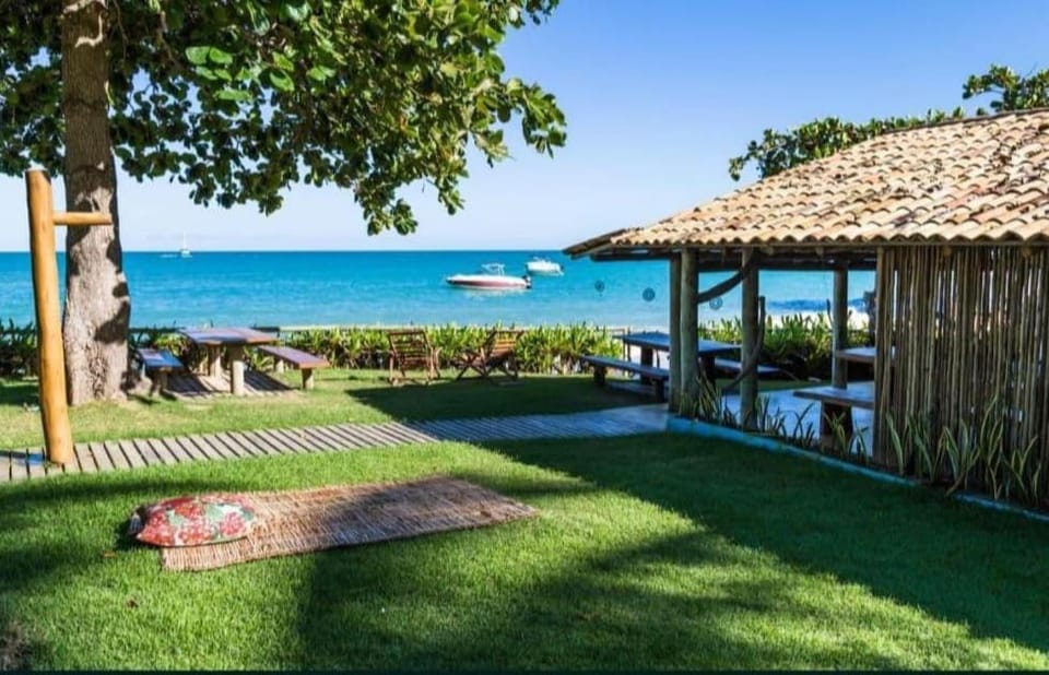 Property building, Patio, Natural landscape, Garden, Beach, Garden view, Sea view, sunbed