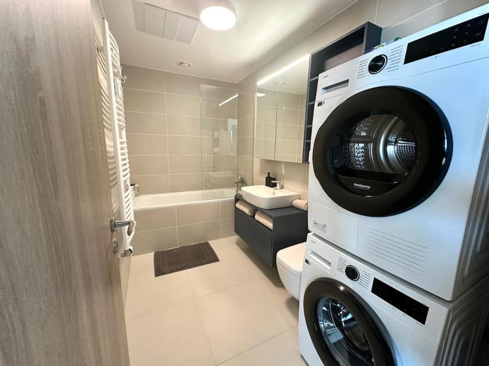 Bathroom, washing machine, dryer
