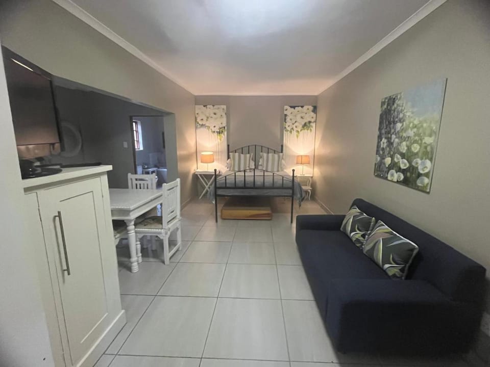 Bed, Living room, Seating area, Bedroom