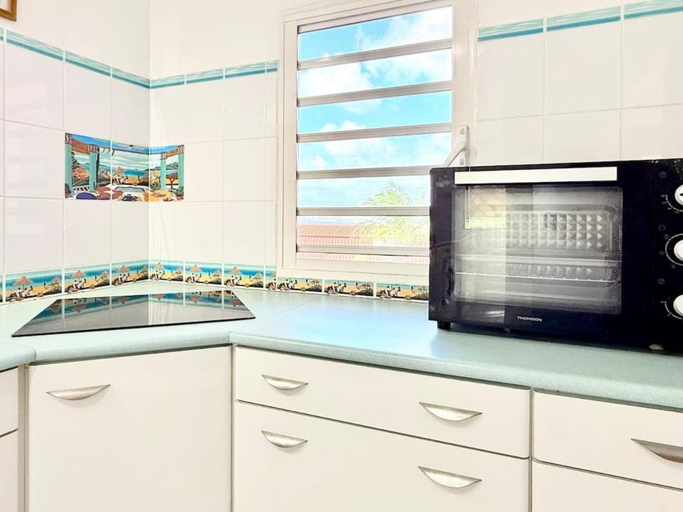 Kitchen or kitchenette, stove