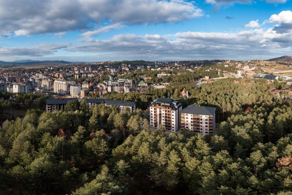Property building, Nearby landmark, Day, Natural landscape, Bird's eye view, Mountain view