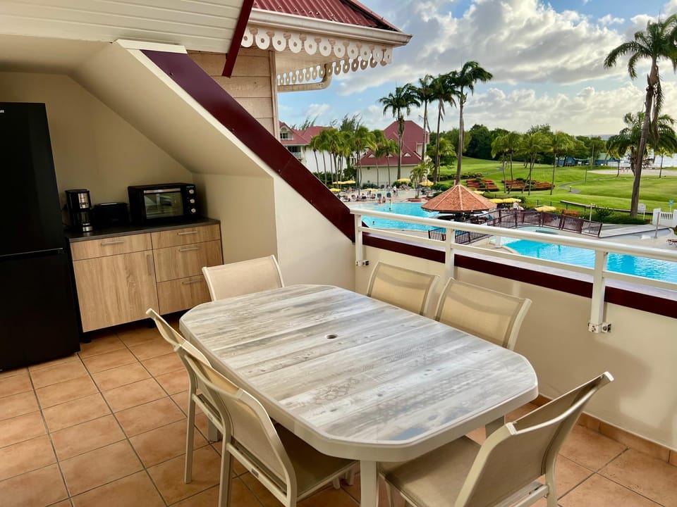 Balcony/Terrace, Balcony/Terrace, Dining area, Pool view, Sea view, oven, toaster, wardrobe, kitchen