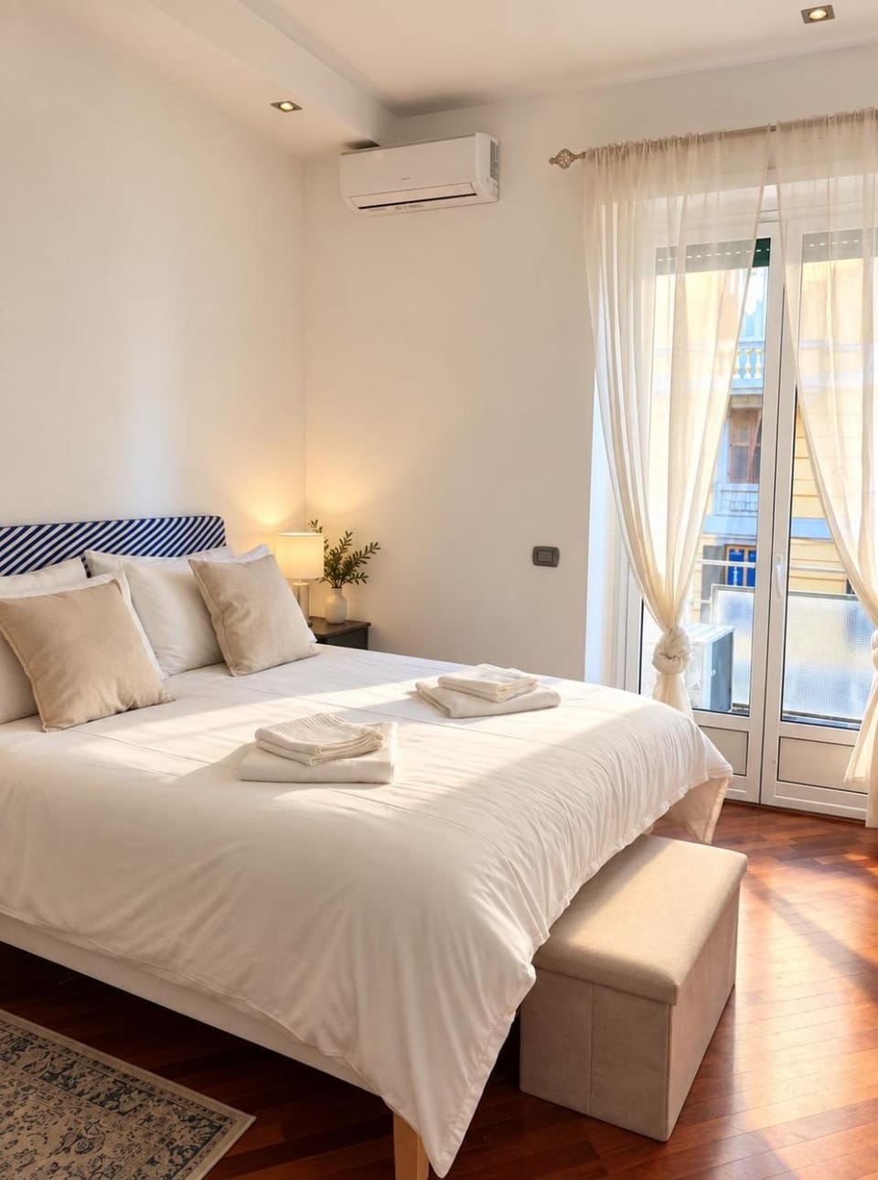 Bed, Photo of the whole room, Bedroom, towels, air conditioner