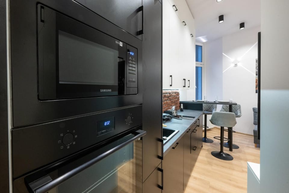 Boutique Glass Apartment by Fengshui4u Apartment in Masovian Voivodeship