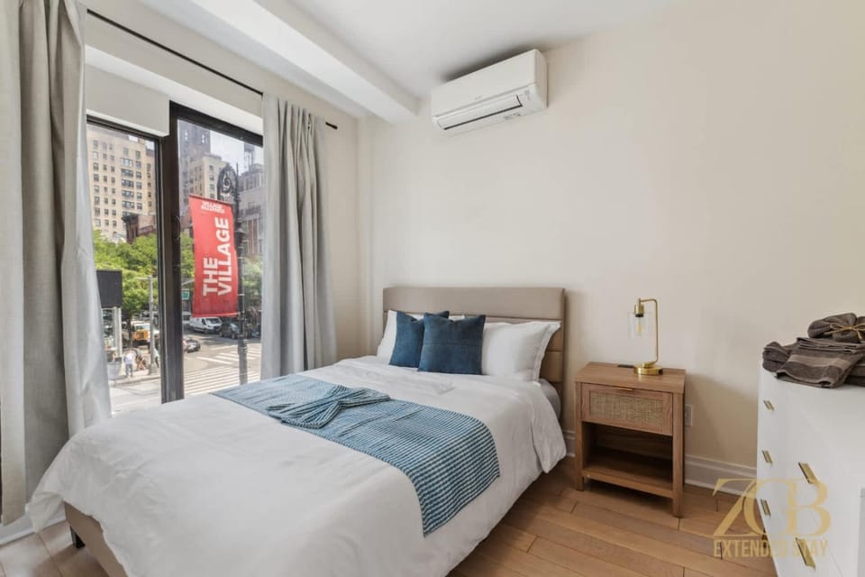 Bed, Photo of the whole room, Bedroom, towels, air conditioner