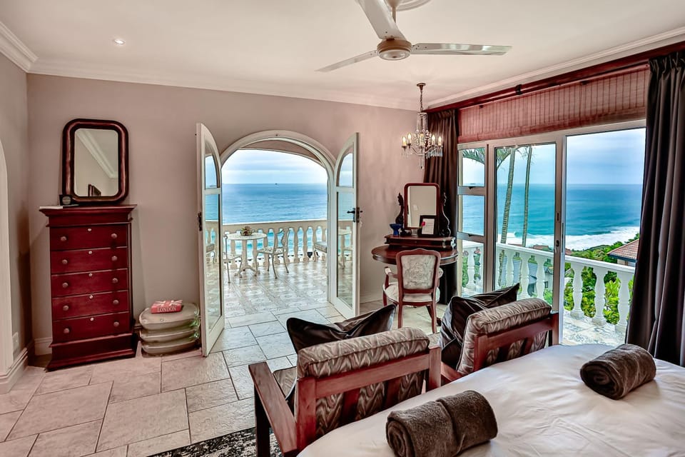 Bed, Natural landscape, View (from property/room), Balcony/Terrace, Seating area, Bedroom, Sea view