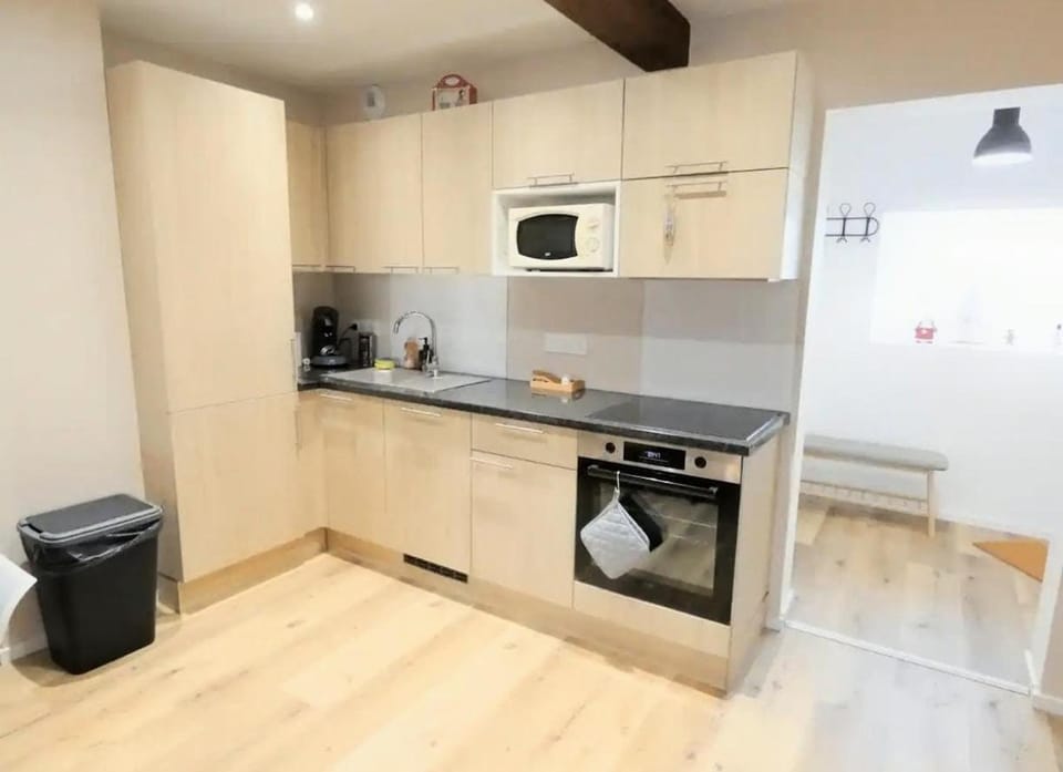 Kitchen or kitchenette, dishwasher, oven, stove