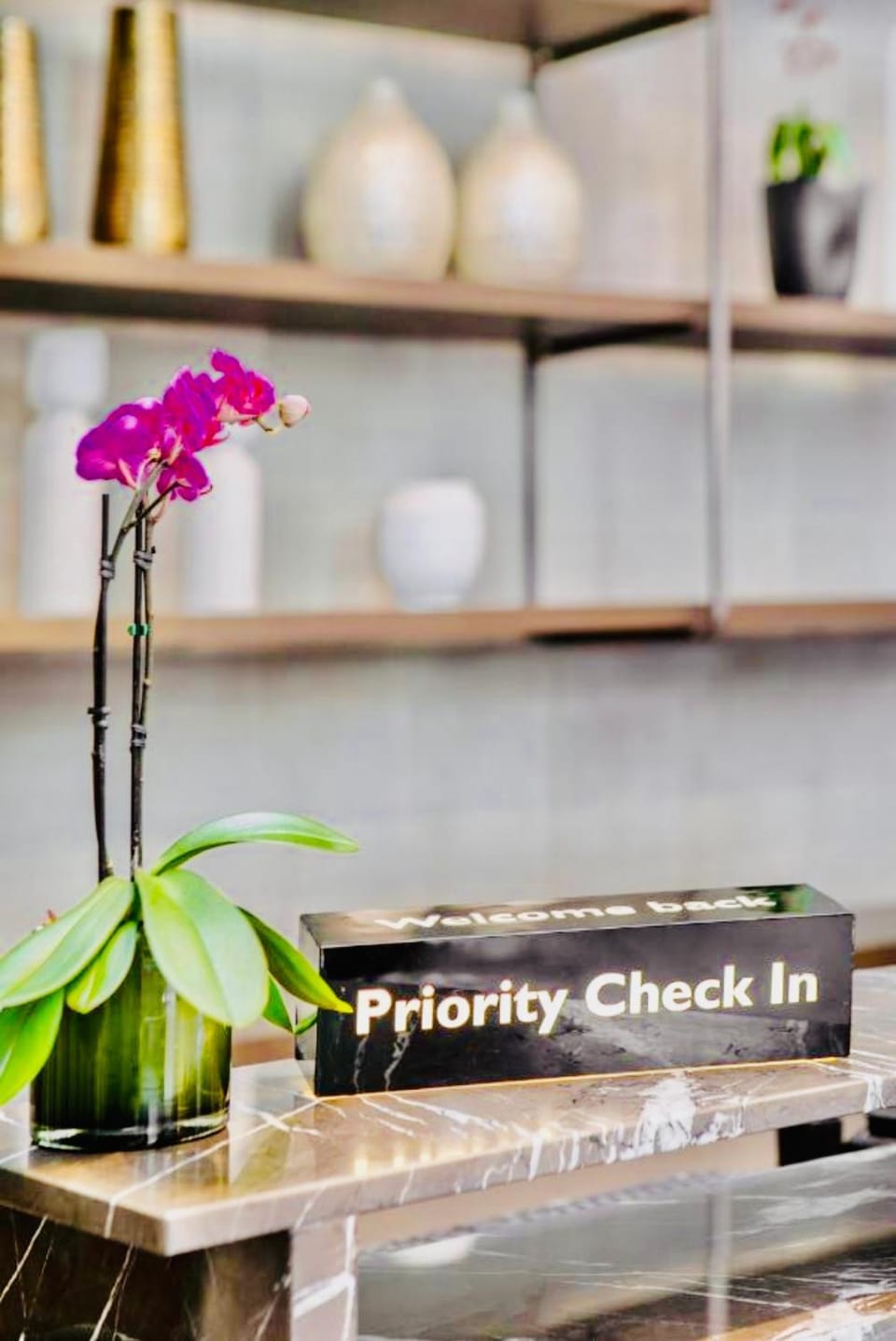 Property building, Facade/entrance, Lobby or reception, Text overlay, concierge