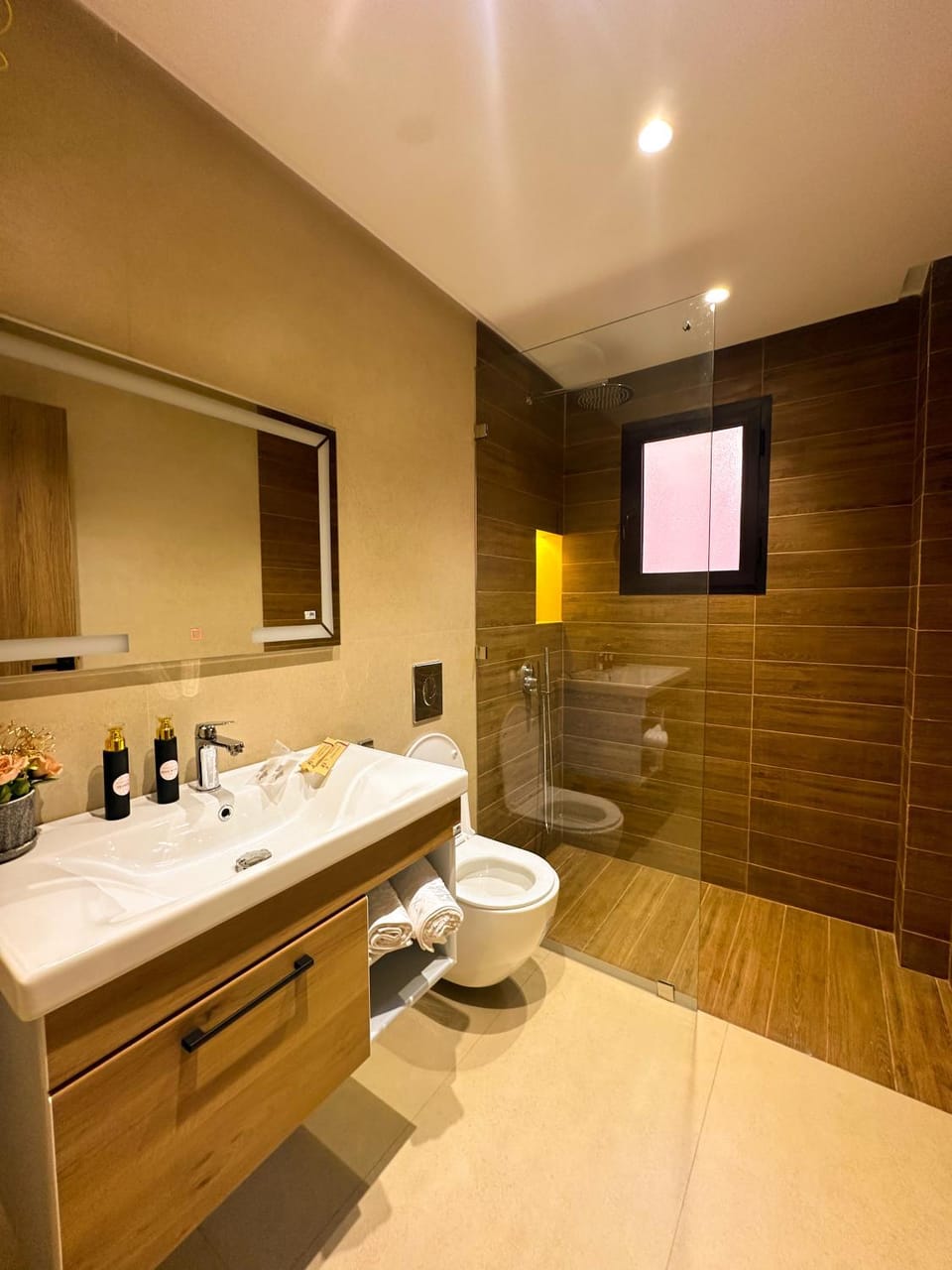 Toilet, Bathroom, Living room, Seating area, towels