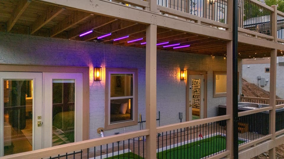 Stay & Sway at this Luxe Modern Retreat with Indoor Pool, Hot Tub, Putting Greens & Fire Pit House in Gatlinburg