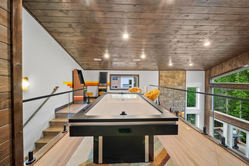 Stay & Sway at this Luxe Modern Retreat with Indoor Pool, Hot Tub, Putting Greens & Fire Pit House in Gatlinburg