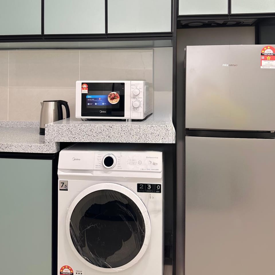 Kitchen or kitchenette, washing machine