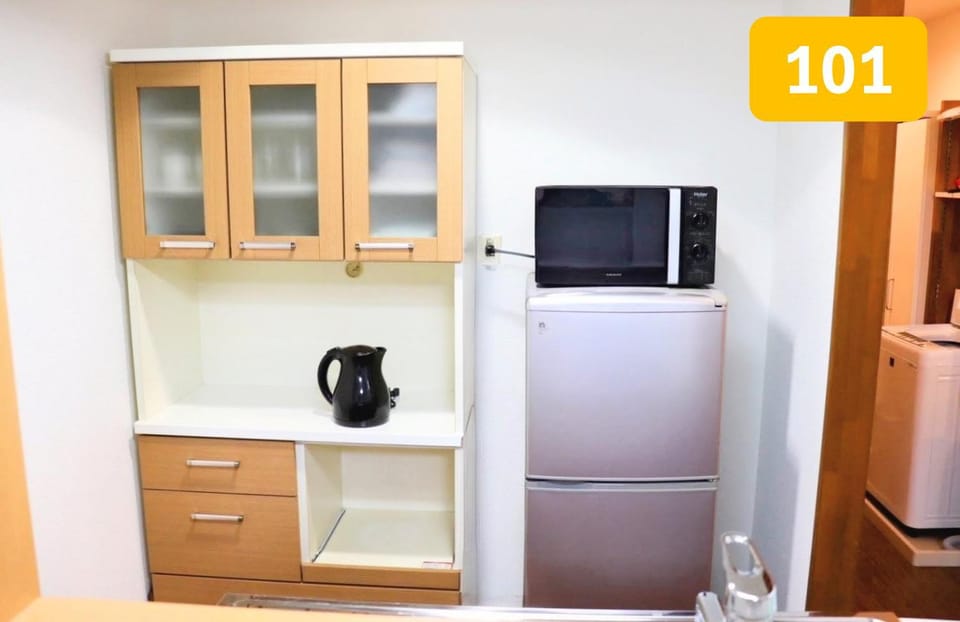 Kitchen or kitchenette, microwave