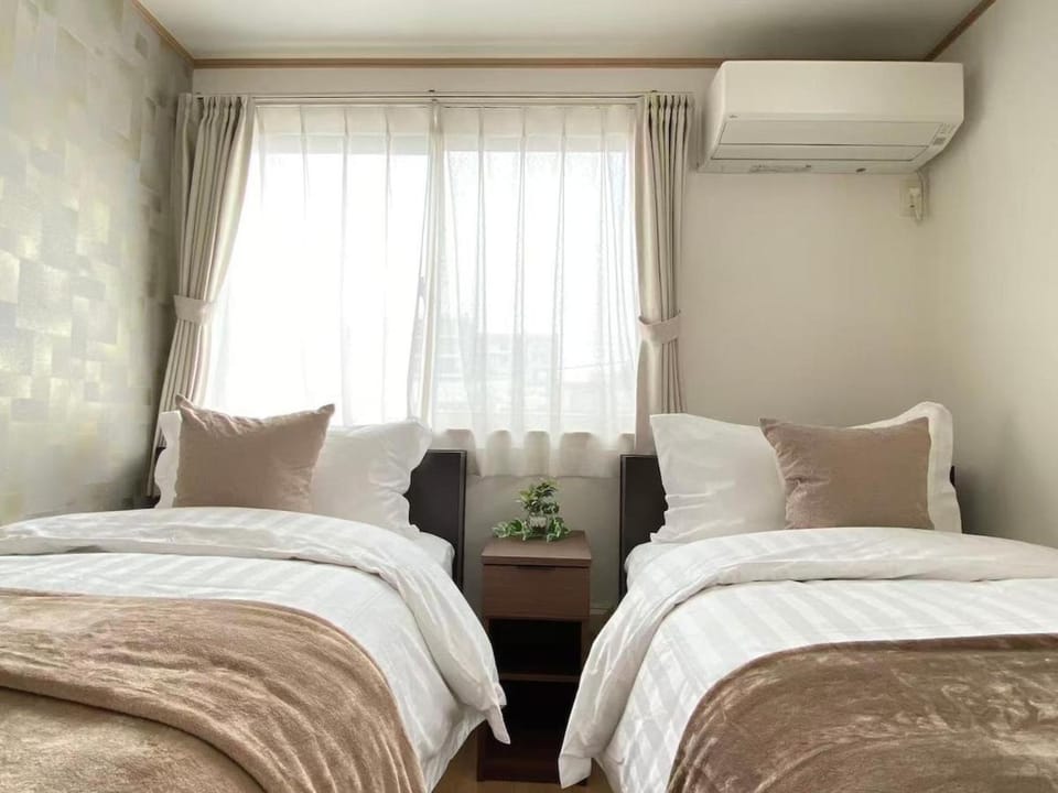 Bed, air conditioner