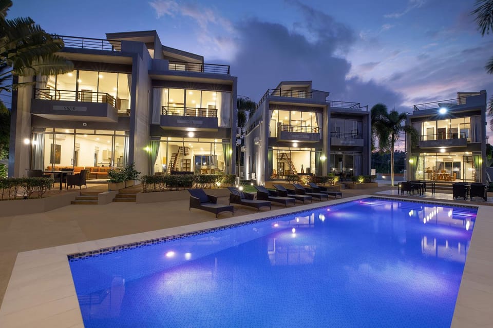 Property building, Night, Pool view, Swimming pool, sunbed