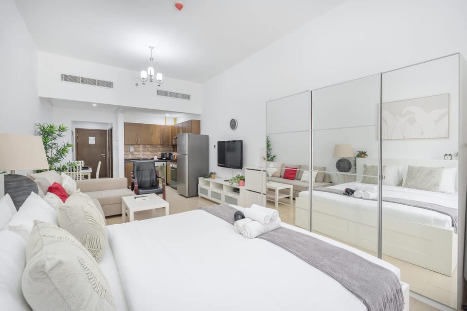 Free housekeeping visits during your stay - StayShort - Cozy Studio in Botanica JVC - Perfect for Three Apartment in Dubai