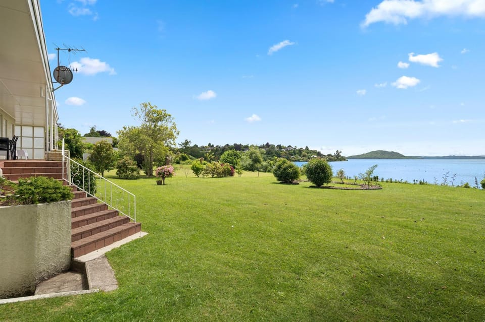 Panoramic Views of Rotorua's lake and Mountains House in Rotorua