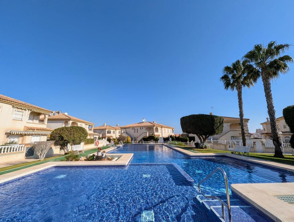 Property building, Living room, Swimming pool