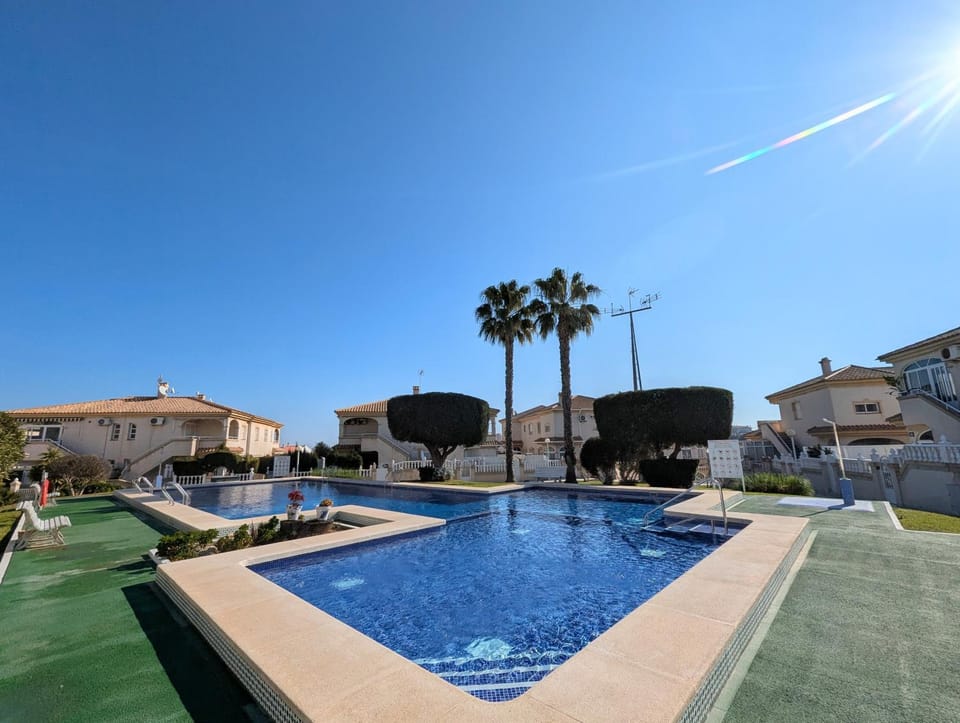 Property building, Living room, Swimming pool