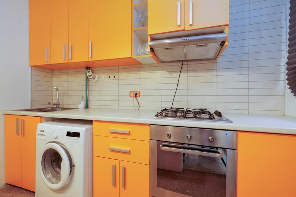 Kitchen or kitchenette, washing machine