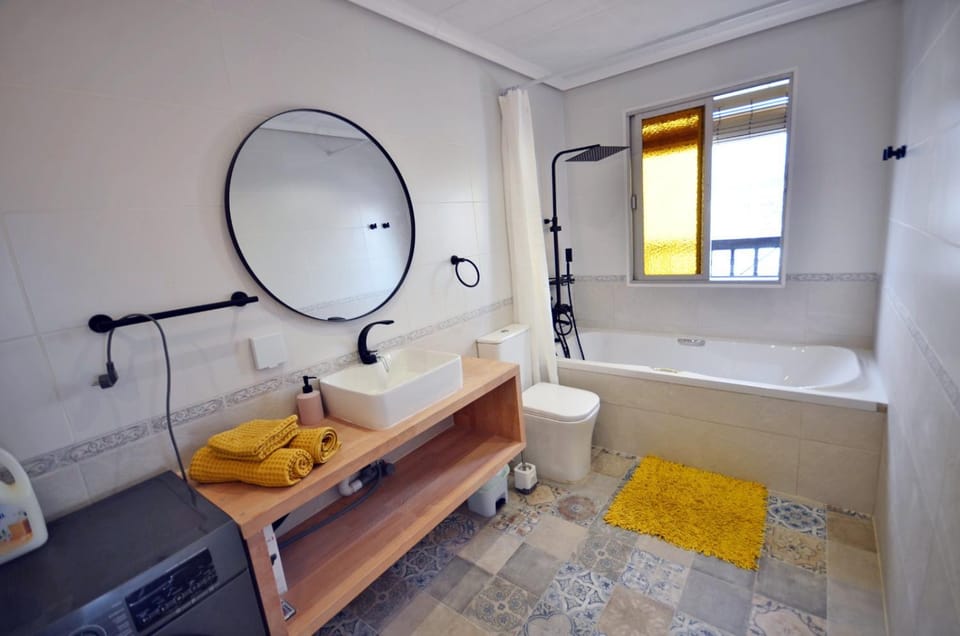 Toilet, Natural landscape, Bathroom, City view, Landmark view, Sea view, Bath, towels, washing machine