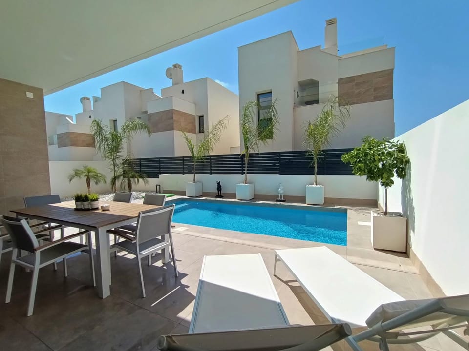 Property building, Living room, Swimming pool