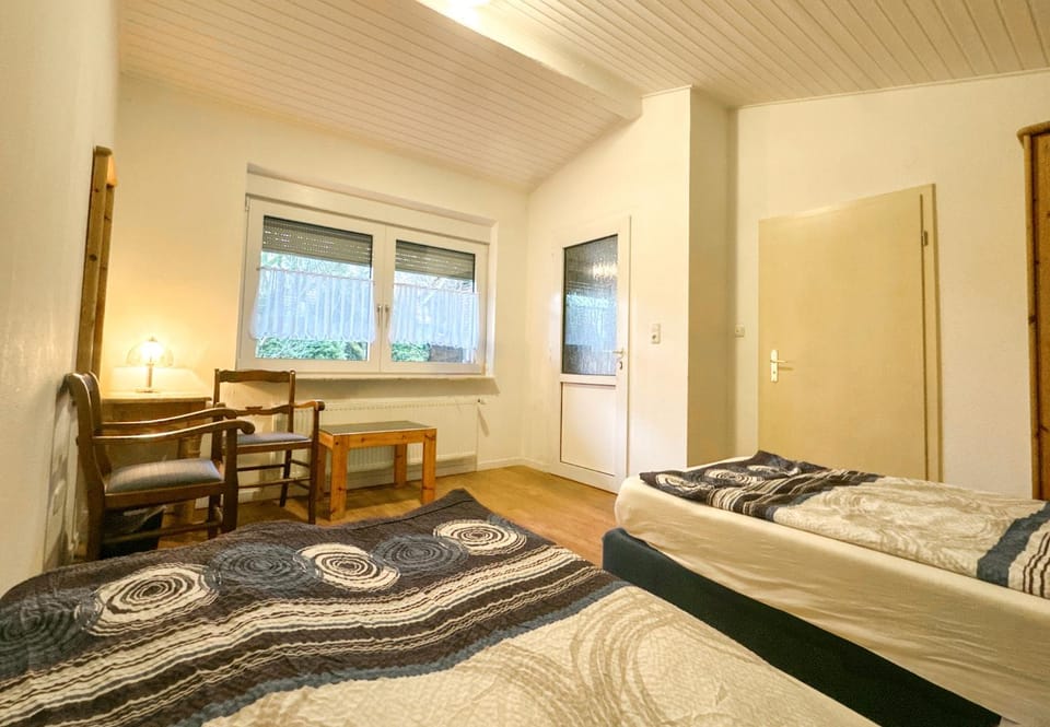 Bed, Seating area, Bedroom