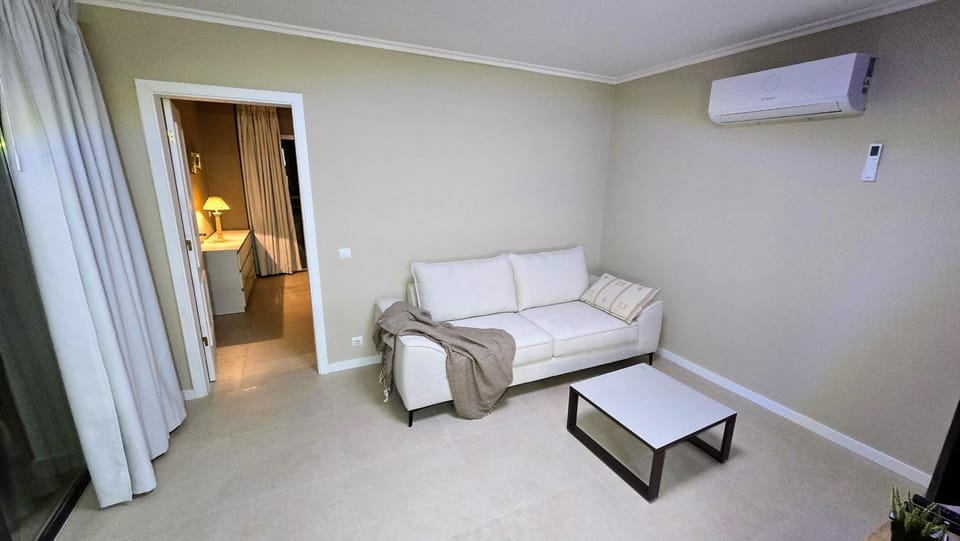 Bed, Living room, Seating area