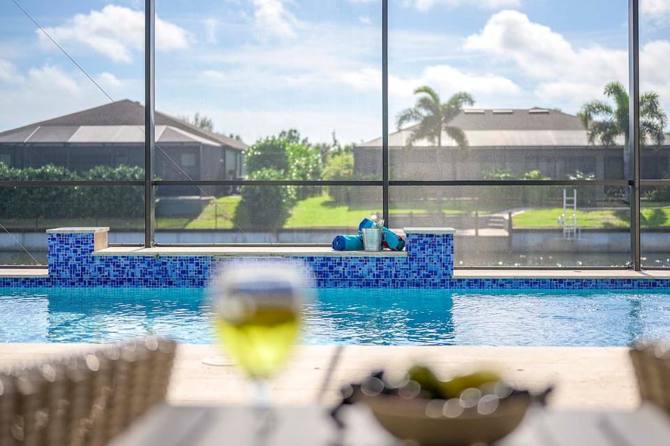 Alora Villa in Central Location with Southern Facing Fresh Water Canal - Vesteva Villa in Cape Coral