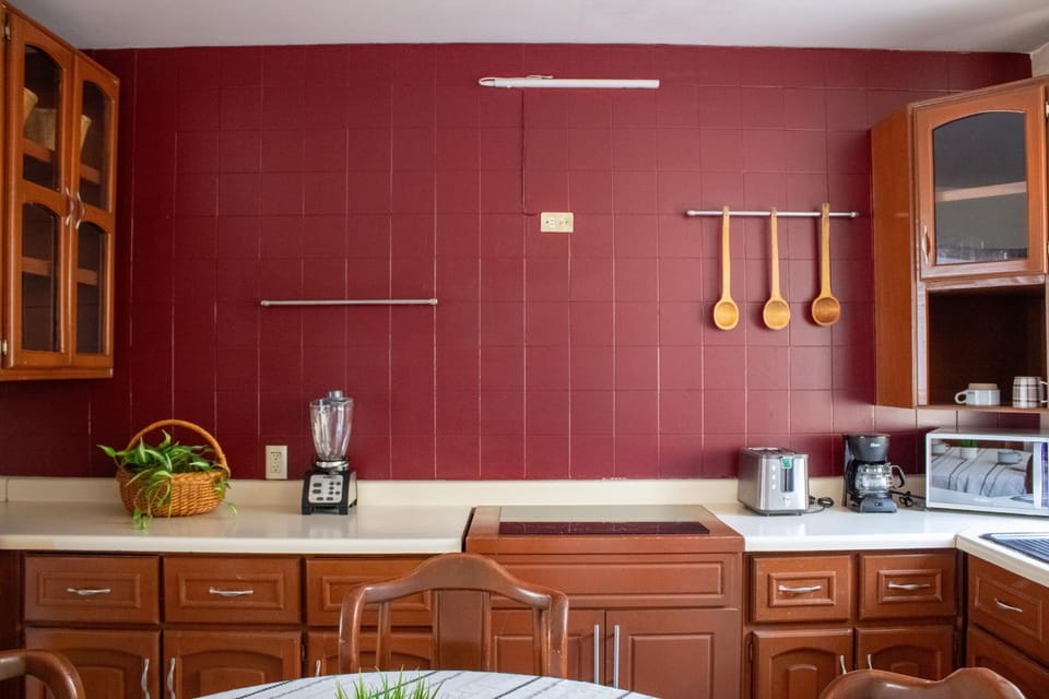 Kitchen or kitchenette, stove, toaster
