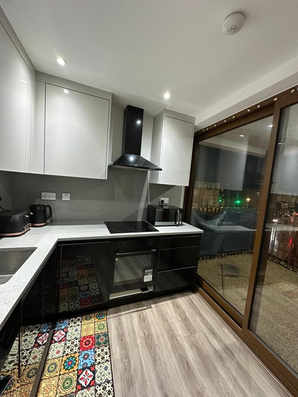Kitchen or kitchenette, oven, stove, toaster