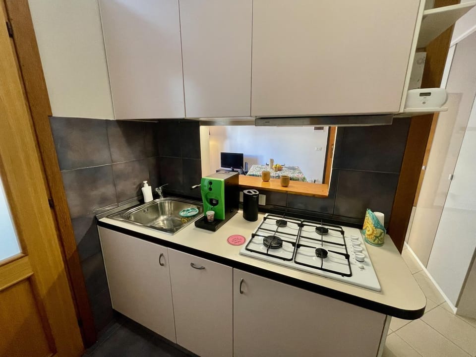 Kitchen or kitchenette, stove