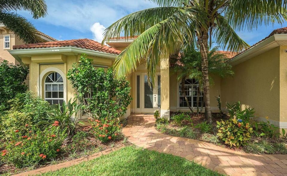 Marais is a Sunset Villa with a Pool and Canal Views Kayaks and Spa Villa in Cape Coral