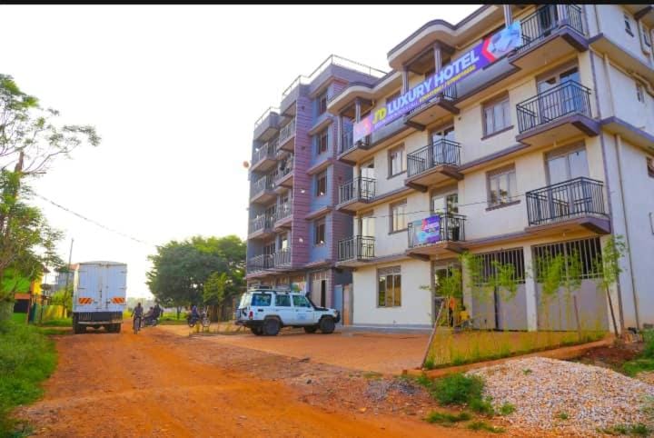 Property building, Day, Neighbourhood, City view, Street view, Location, Parking