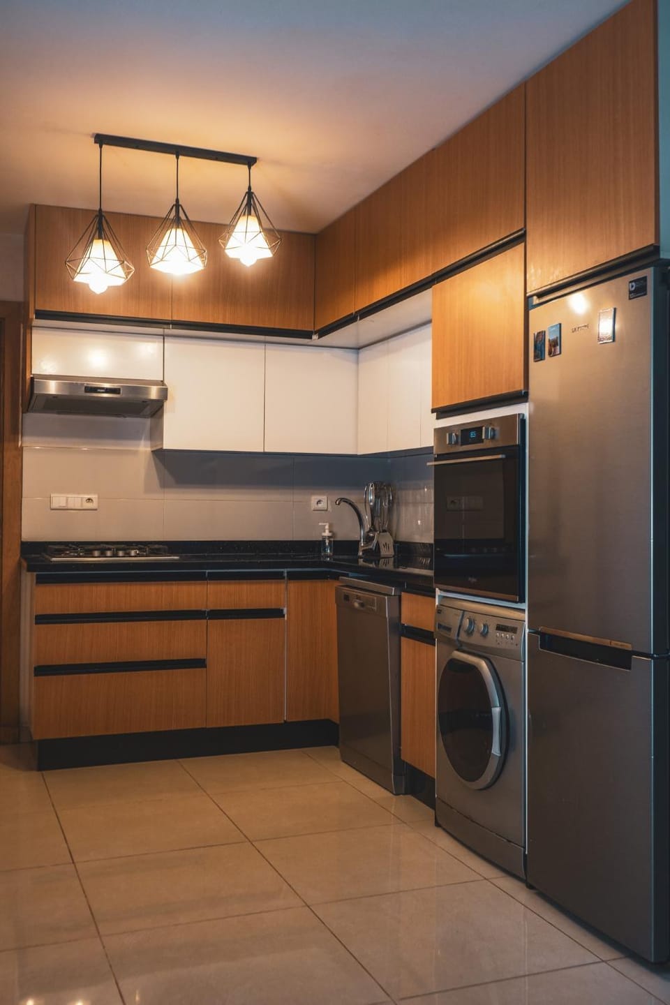 Kitchen or kitchenette, dishwasher, oven, washing machine