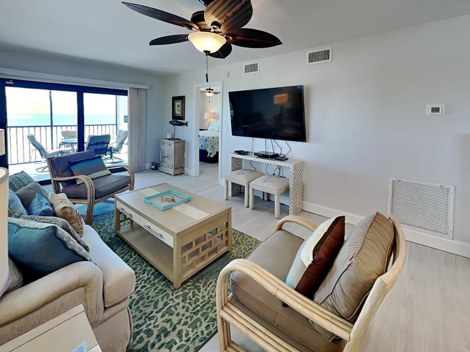 TV and multimedia, Balcony/Terrace, Living room, Seating area, furniture, air conditioner
